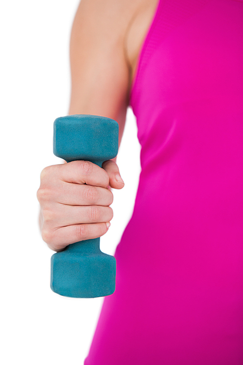 Fit woman with blue dumbbell on white background