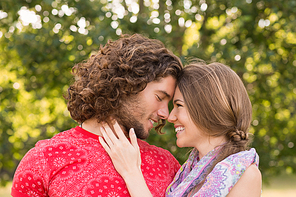 Cute couple in the park on a sunny day