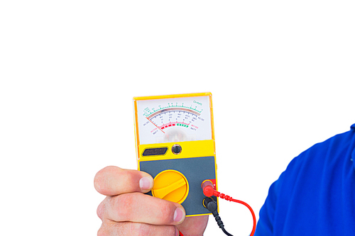 Cropped image of electrician holding voltage tester over white background