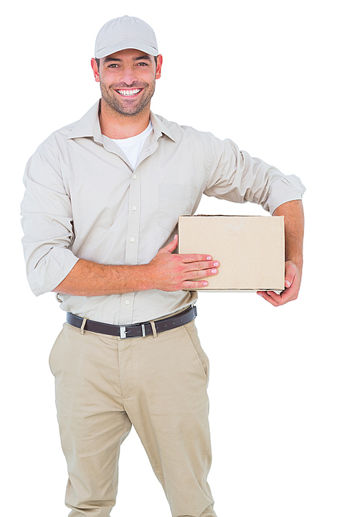 Portrait of happy delivery man with cardboard box on white background