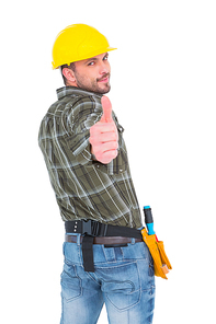 Confident manual worker gesturing thumbs up on white background