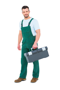 Repairman holding toolbox on white background