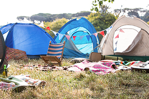 Empty campsite at music festival on a sunny day