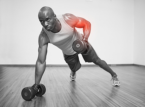 Digital composite of Highlighted arm of strong man lifting weights