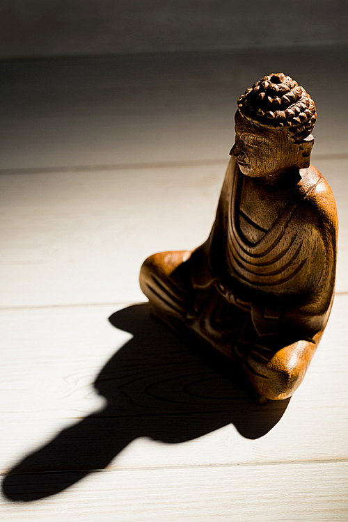 Buddha statue on a table shot in studio