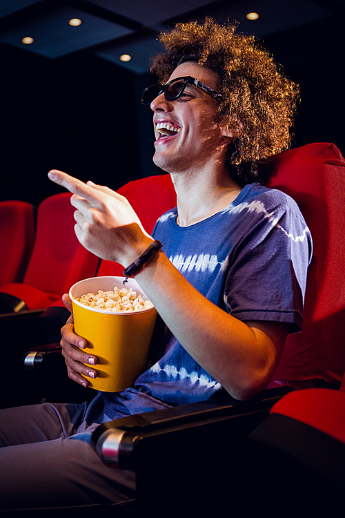 Young man watching a 3d film