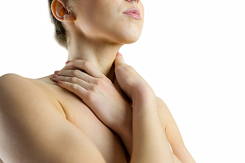 Nude woman with a neck injury on white background