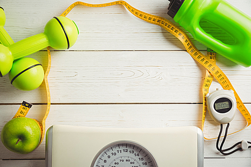 Indicators of healthy lifestyle on wooden table