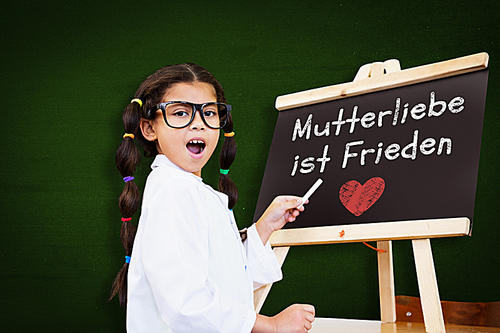 Composite image of cute pupil with chalkboard