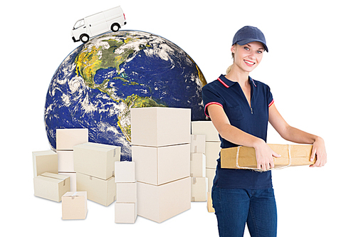 Composite image of happy delivery woman holding cardboard box