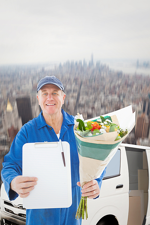 Composite image of happy flower delivery man showing clipboard