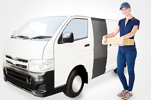 Composite image of happy delivery woman holding cardboard box