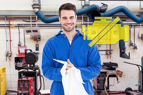 Composite image of male mechanic wiping hands with cloth