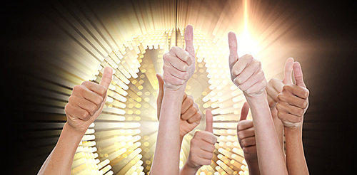 Composite image of hands up and thumbs raised