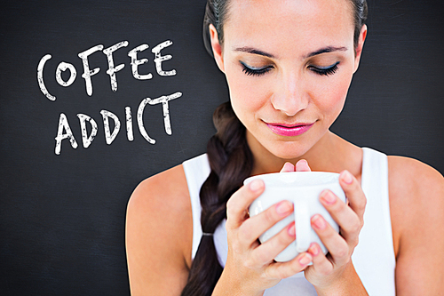 Composite image of pretty brunette having cup of tea