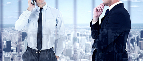 Composite image of elegant businessman in suit posing