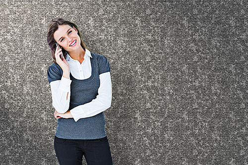 Composite image of happy blonde on the phone