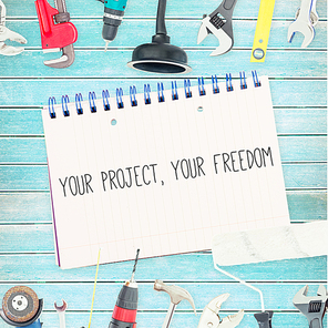 Your project|your freedom against tools and notepad on wooden background