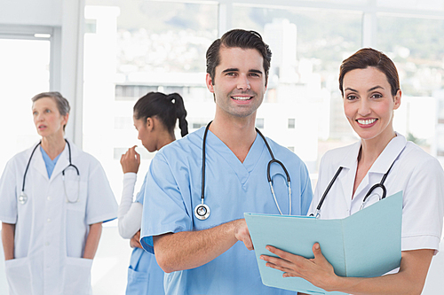 Team of doctors working on their files