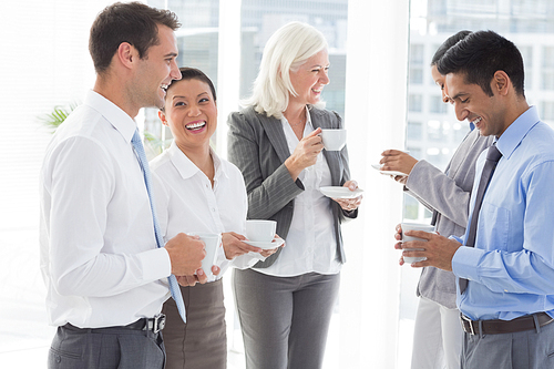 Happy work team during break time in office