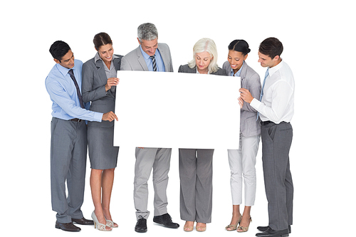 business people holding blank board in office