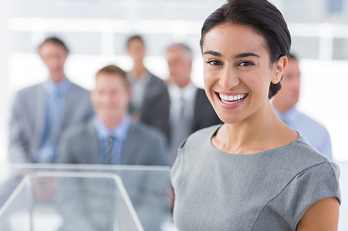 Smiling businesswoman  during conference in meeting room