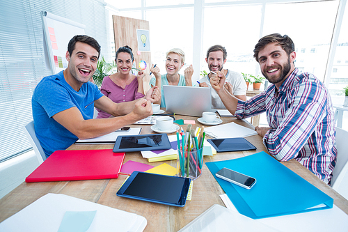 Portrait of creative business people in meeting at office