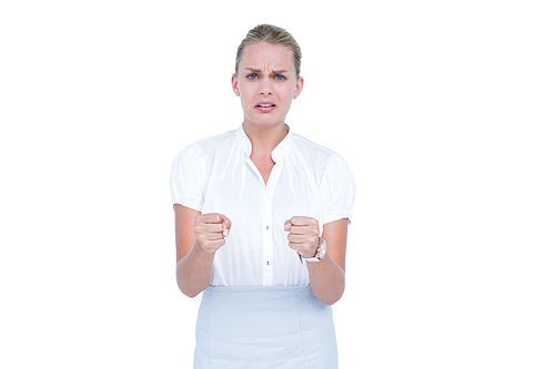 businesswoman being annoyed against white wall