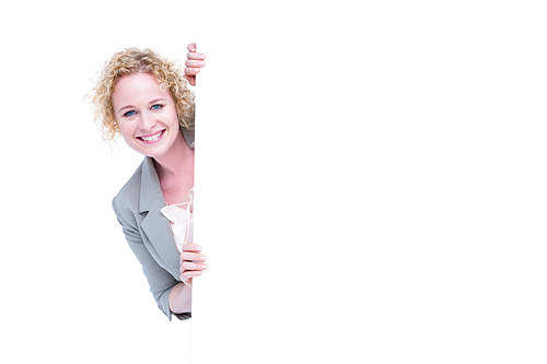 Woman looking around blank sign on white background