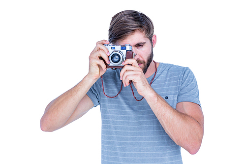 Happy handsome man taking pictures on white background