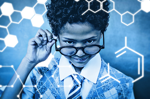 Science graphic against cute little boy holding glasses