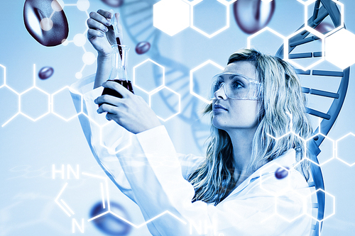 Female scientist examining blood against science graphic