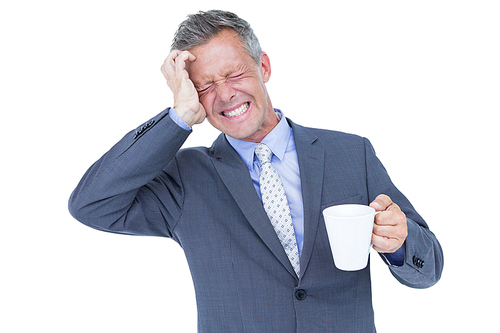 businessman drinking cup of coffee before work