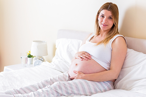 Pregnant woman  at home