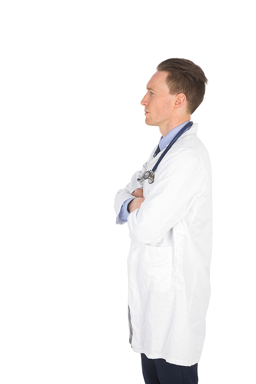 Profile view of a doctor with arms crossed on white background