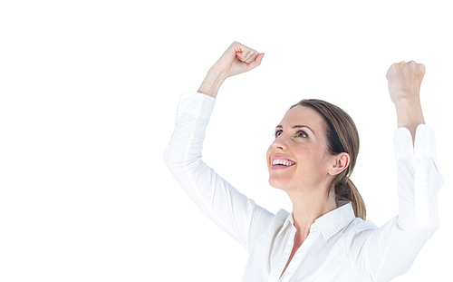 Close up of a businesswoman cheering with arms up against a white background