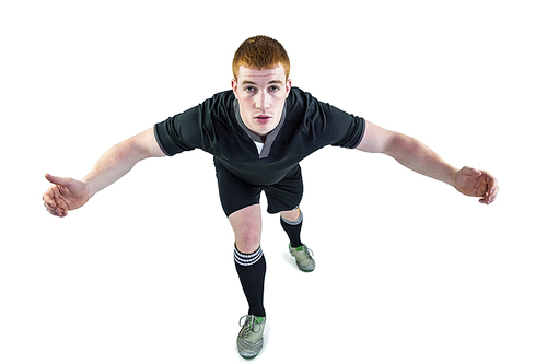 Portrait of a rugby player tackling the opponent