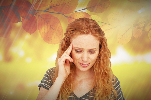 Composite image of blonde woman having headache