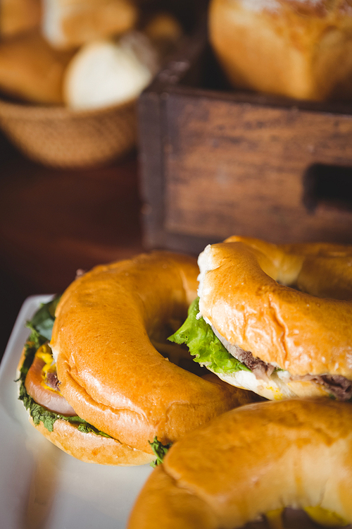 Close up view of filled bagel at coffee shop