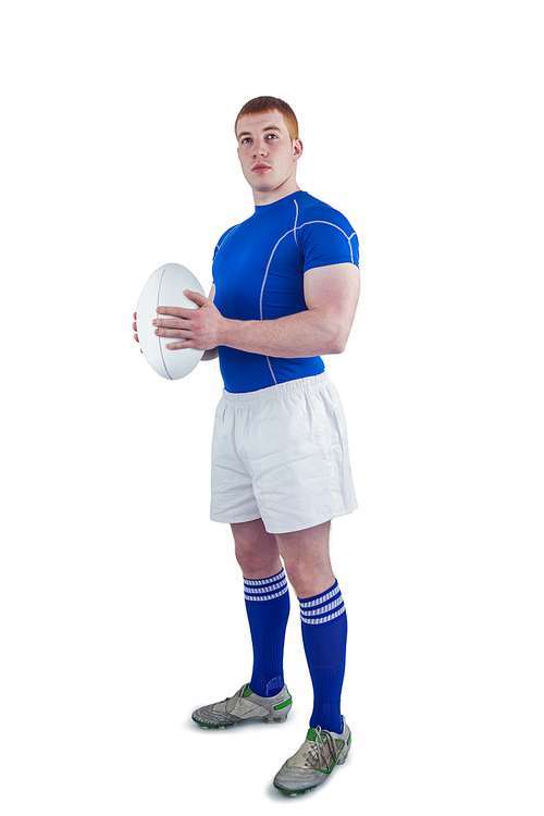 A rugby player holding rugby ball on a white background
