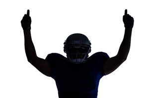 Silhouette American football player with thumbs up against white background