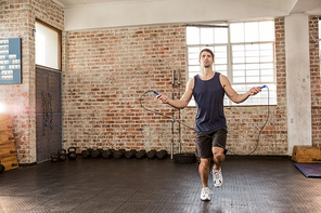 Man skipping wearing sportswear