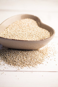 Sesame seed in heart shaped bowl