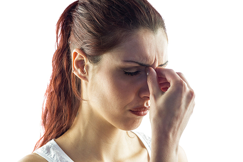 Close-up of woman experiencing headache