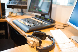 Close-up of headphones on desk