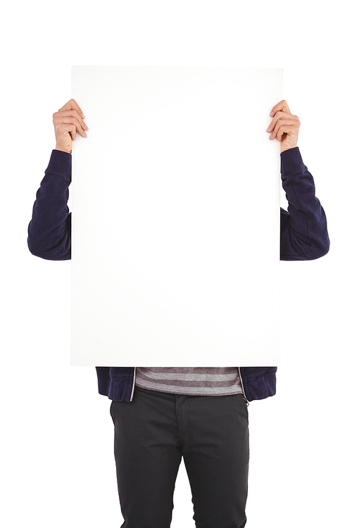 Man showing billboard in front of face