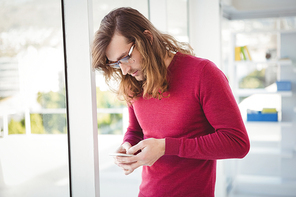 Hipster using mobile phone