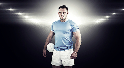 Composite image of rugby player 