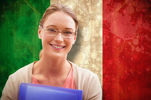 Teaching student smiling against italy flag in grunge effect