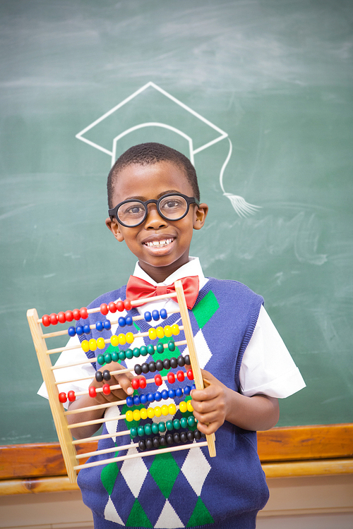 Graduation hat vector against smiling pupil holding abacus